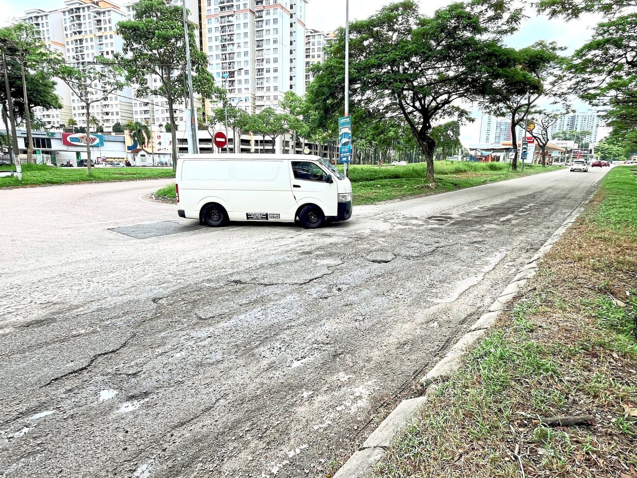Jalan Skudai Lama in Johor Baru, near KIP Mall Tampoi, is filled with potholes and bumpy surfaces. This stretch of the road is always wet and damaged even after repairs are carried out.