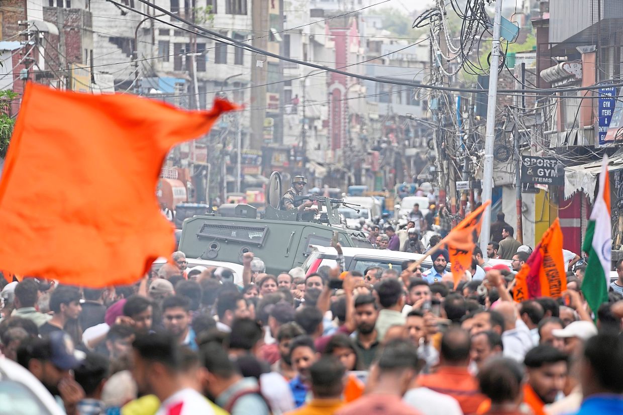 Indian youths gathering in protest against the Pahalgam terror attack in Jammu. - AP
