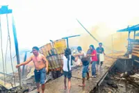 Morning fire razes 21 homes