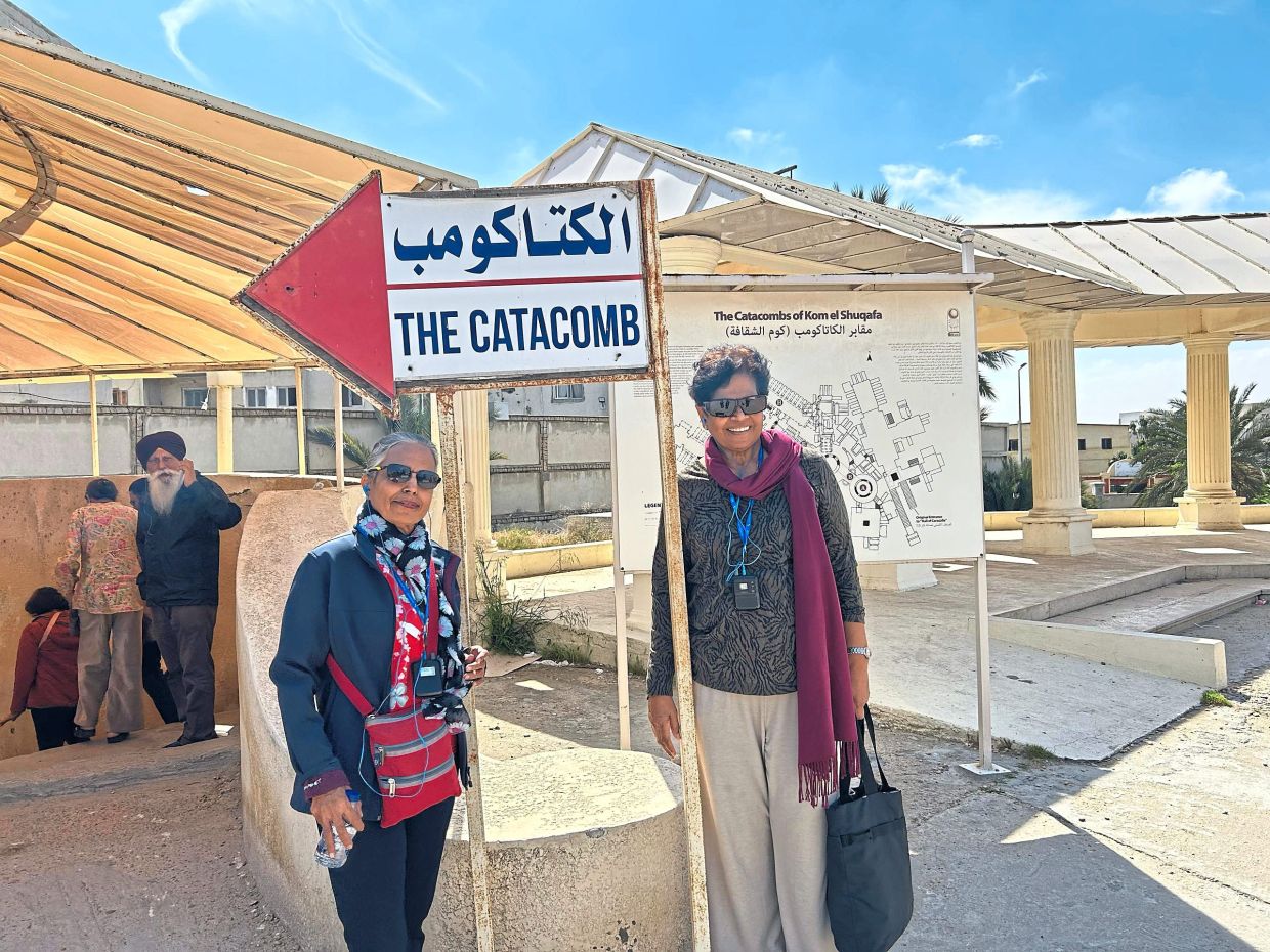 The reader (right) at the Catacomb.