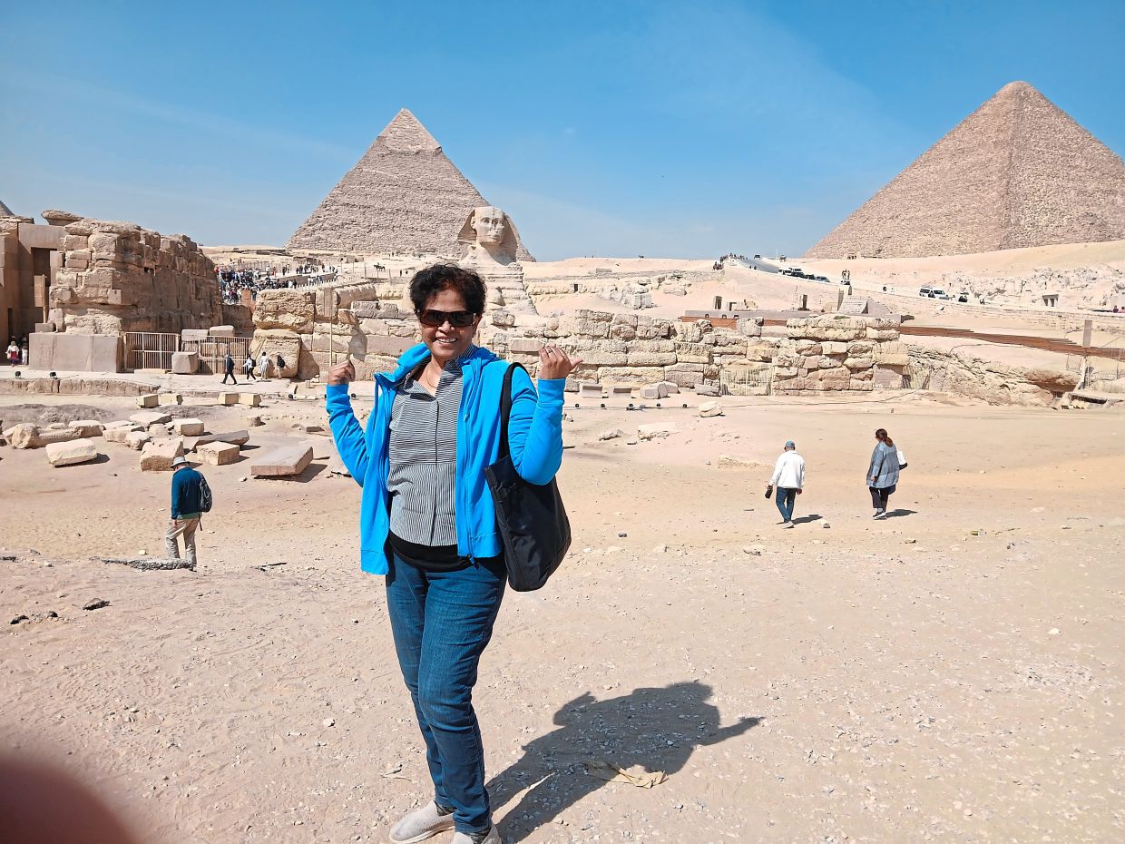 The reader was happy to finally see the pyramids in Egypt. — Photos: JANE LAZAR