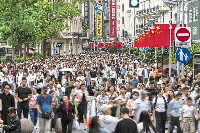 Profit rebound: Shoppers on Nanjing East Road in Shanghai. Beijing has made increasingly louder calls on exporters to find local buyers as an alternative to the US market, now effectively frozen after Washington hiked tariffs on Chinese goods by 145%. — Bloomberg