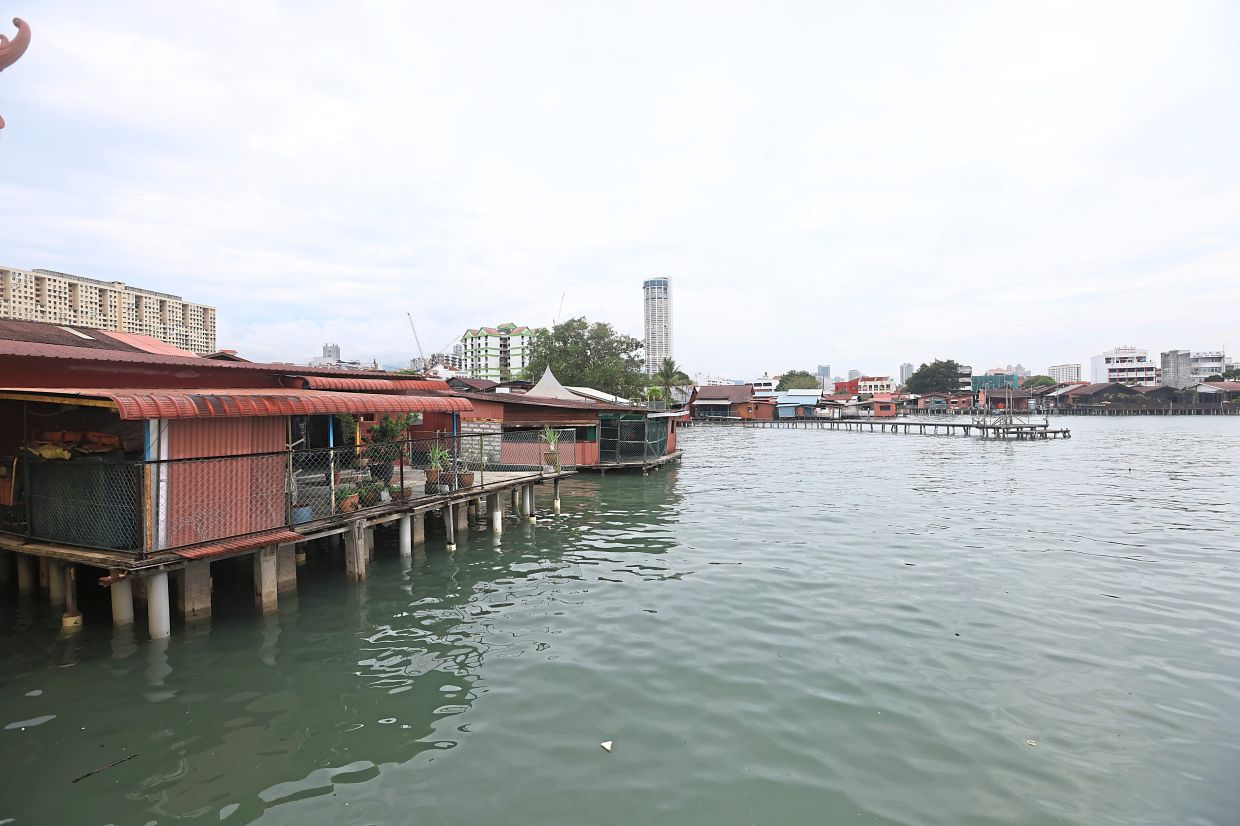 Some of the wooden houses in the village, which is home to over 200 families, are perched on stilts over the water.