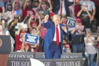 Trump bashes Powell, touts tariffs at rally
