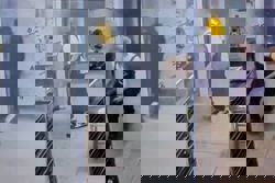 Chinese prankster locks colleague in freezer room, smirking as woman pleads for help