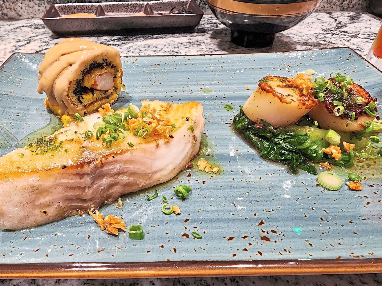 From the kaiseki menu, diners will get to choose seafood items like grilled cod or grilled scallops, both of which are delicious. — ABIRAMI DURAI/The Star 