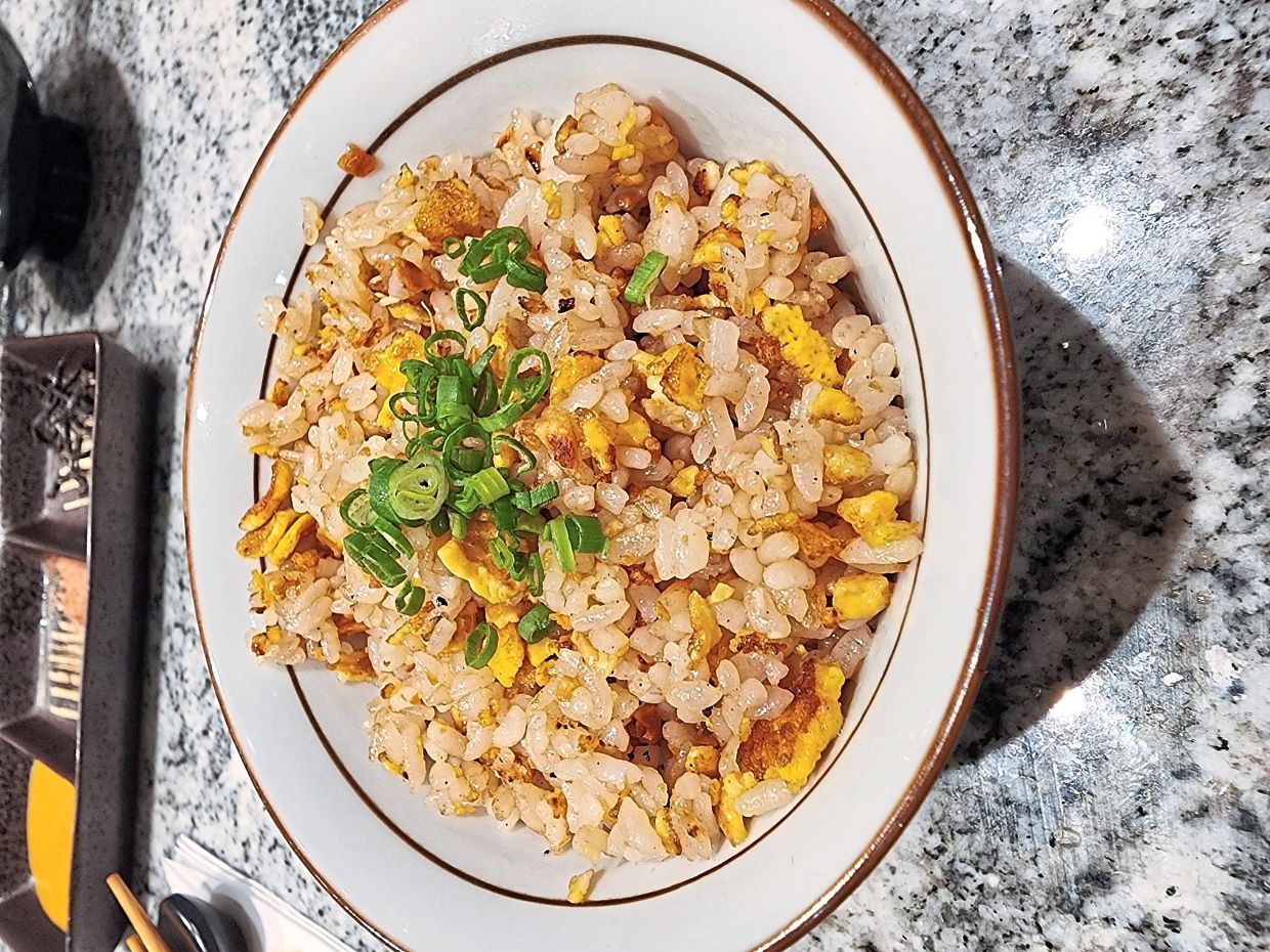 The garlic fried rice is one of the show-stopping offerings at Benihana. — ABIRAMI DURAI/The Star 