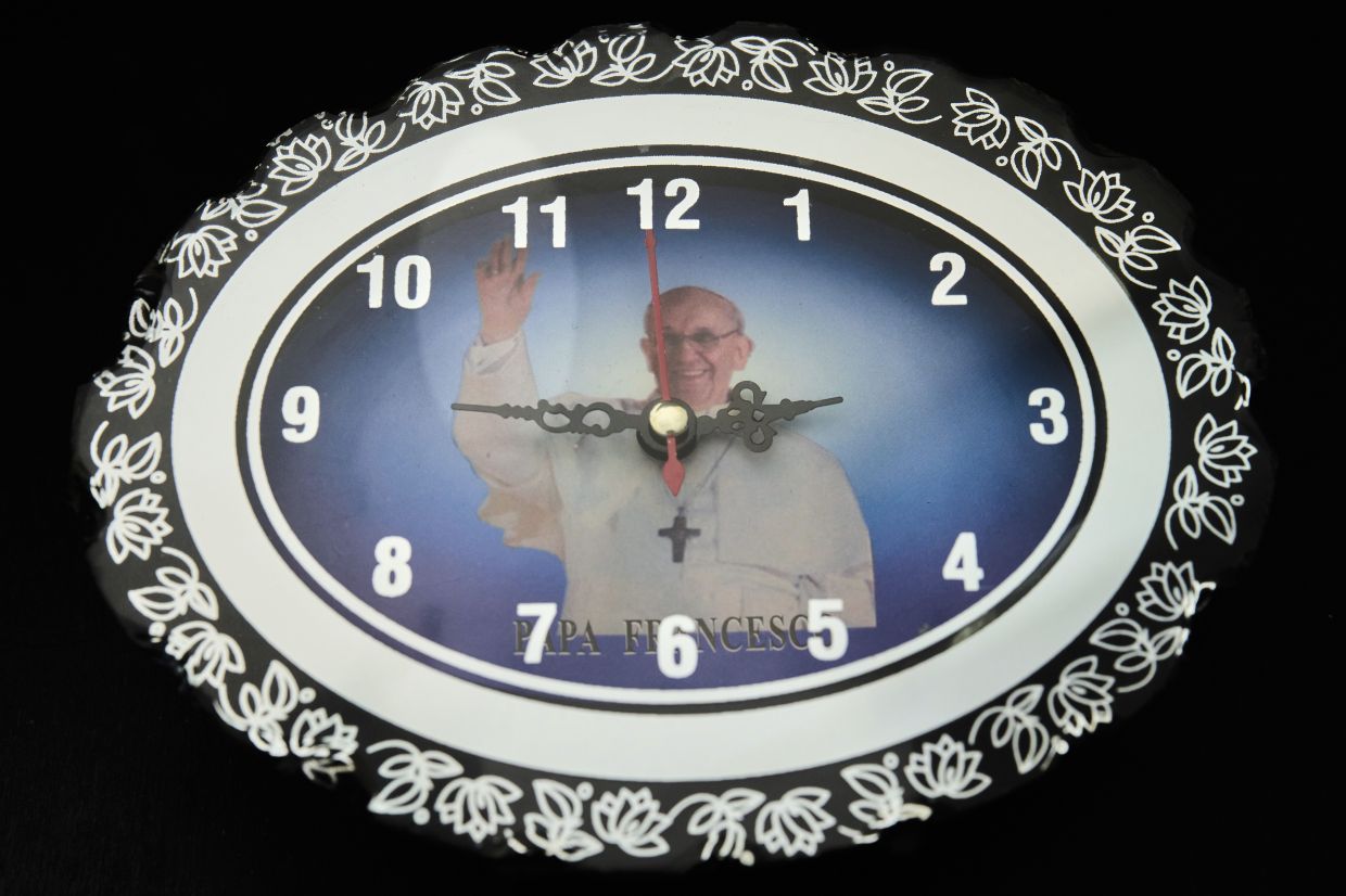 A Pope Francis-themed souvenir watch. 