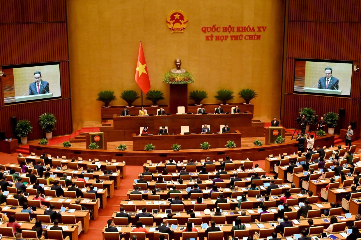 Vietnam's members of parliament attend the National Assembly's summer session opening in Hanoi on Monday, May 5, 2025. -- Photo by Nhac NGUYEN / AFP