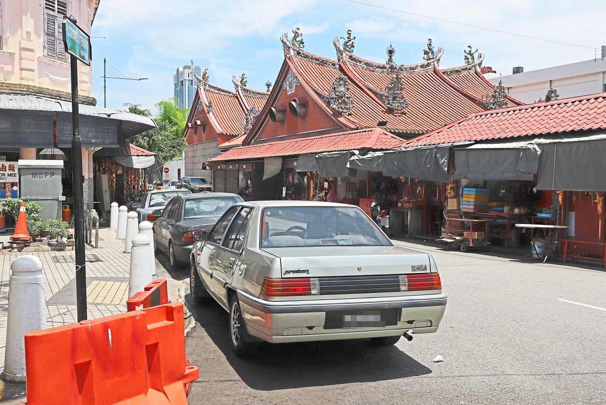 Cars parked illegally in George Town, Penang, risk being fined by enforcement officers using the ANPR. — Filepic