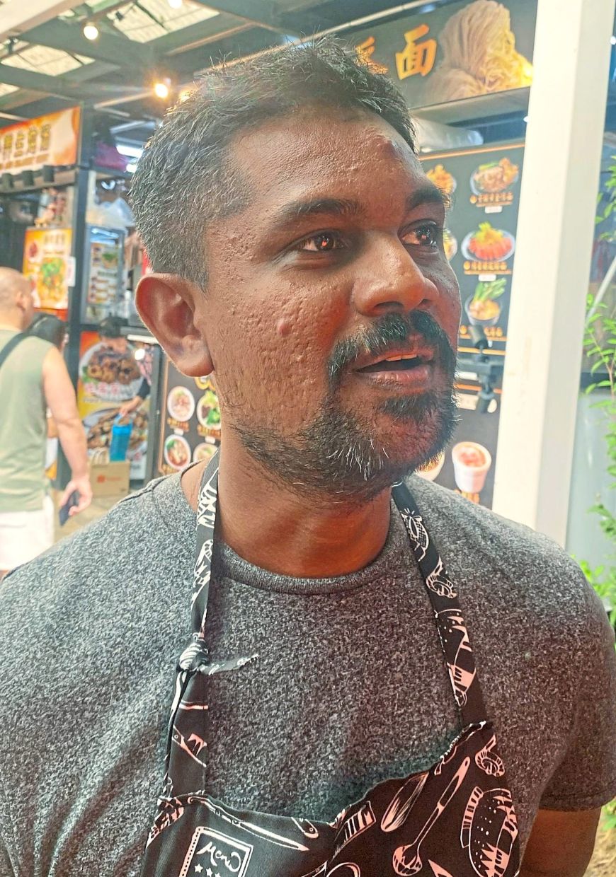 Hanees says he may lose customers who fear being caught by the ANPR when stopping for a short while to pack food.