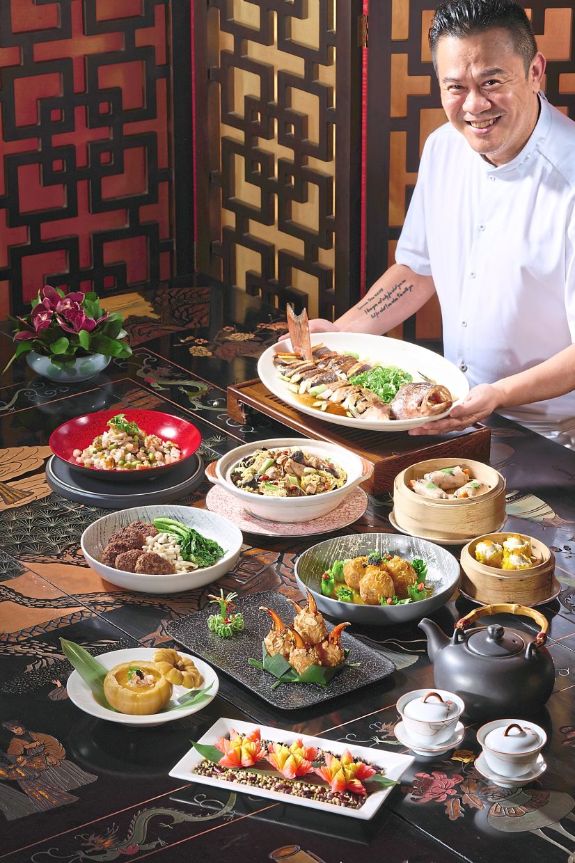 Yeap with dishes from the Legendary Menu at Shang Palace.