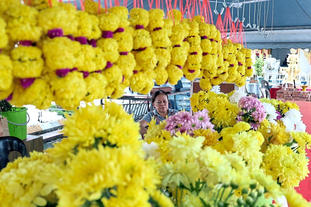 During Wesak, devotees make offerings such as flowers, joss sticks, incense and lotus-shaped candles.