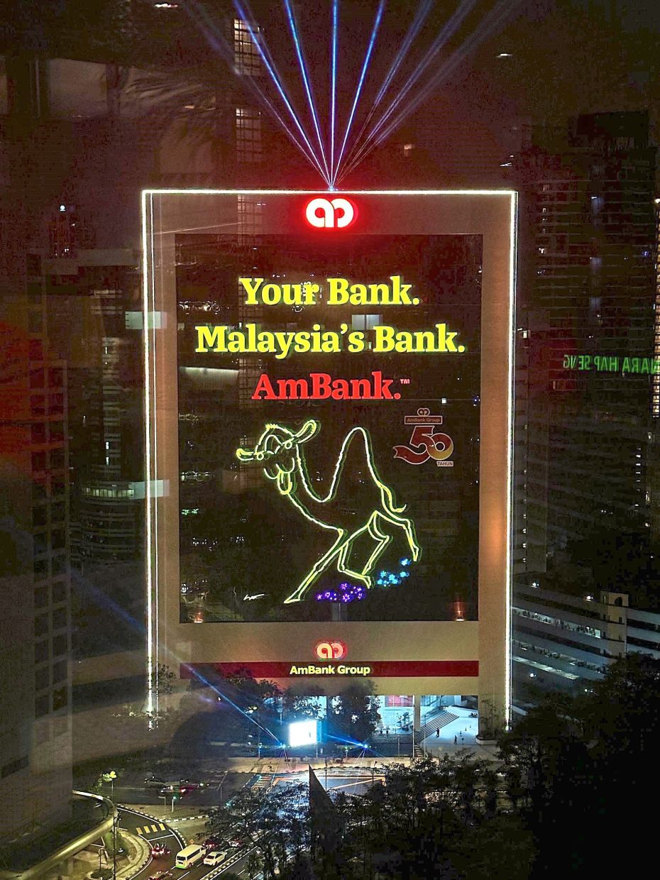 The newly refreshed facade of Bangunan AmBank Group now features a vibrant LED display of the bank’s camel mascot.