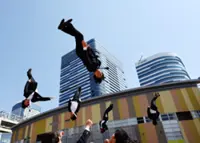 Japanese 'salarymen' inspire with cheerleading acrobatics