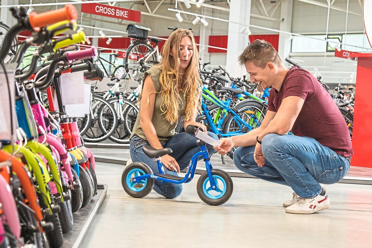 Using a local store for a first bike for your youngster means you can get advice and test out different models. Photo: CHRISTIN KLOSE/dpa-tmn/dpa