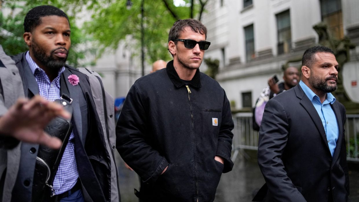Alex Fine (centre), husband of Casandra Ventura, leaves the Federal court during the Sean 'Diddy' Combs' sex trafficking and racketeering conspiracy trial. Photo: Reuters