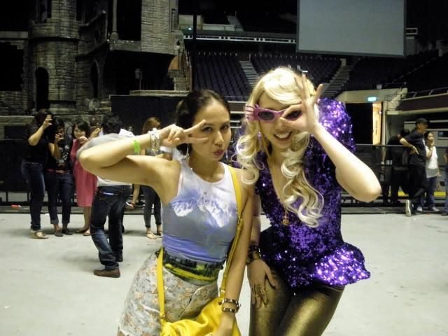 Natasha (left) posing for a picture with another fan during the Lady Gaga concert in 2012.
