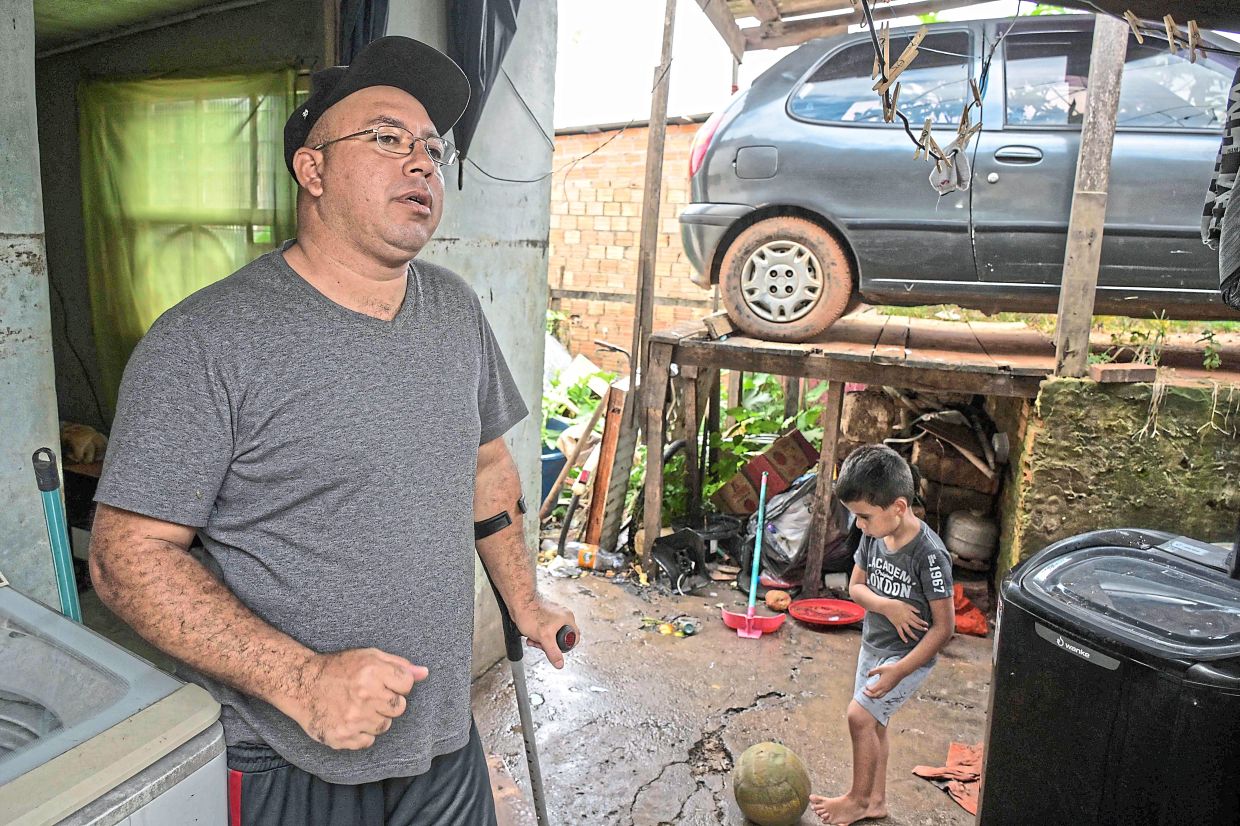 Poli, a resident of the Sarandi neighbourhood, speaking during an interview in Porto Alegre. — AFP