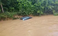 Driver of 4WD swept away in failed attempt to cross swollen river