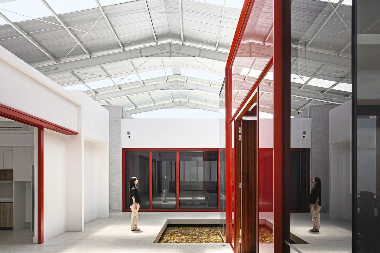 The inner courtyard, showing the red 'jewel box' structure which is the boardroom. Photo: A3 Projects/Arch Cubica Architects (Malaysia)