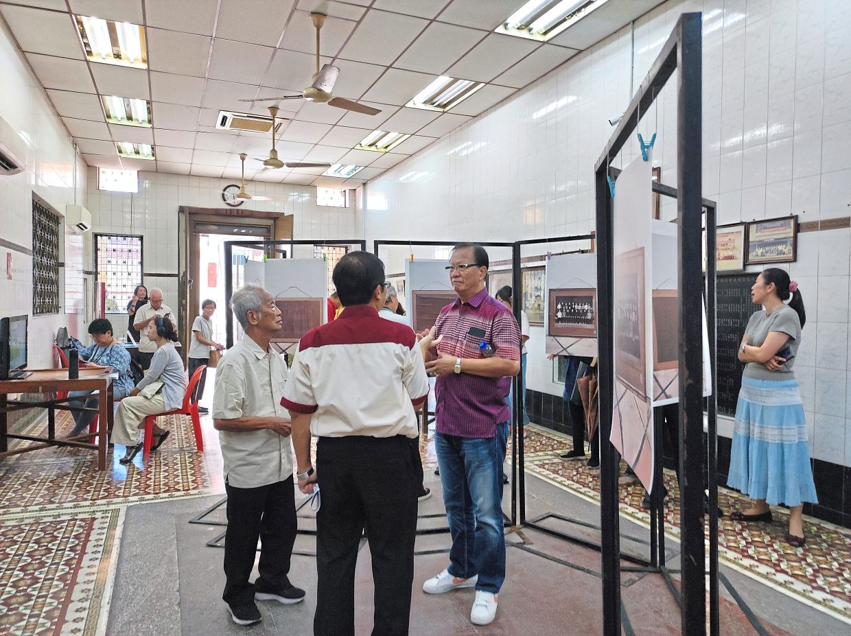Visitors at the majie exhibition at the Soon Tuck Wooi Koon venue on Love Lane in George Town, Penang. Photo: Andrea Filmer