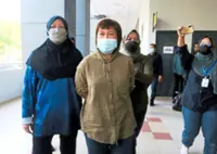 Ex-lecturer sentenced to 10 years' jail for causing husband's death