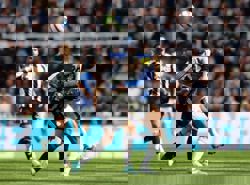 Soccer-Newcastle secure Champions League spot on final day despite Everton defeat