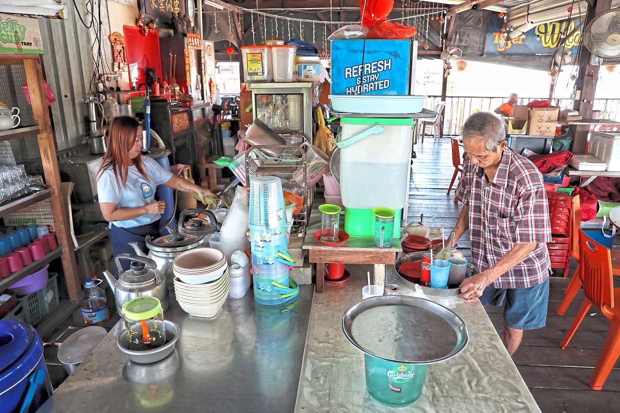 A quaint coffeeshop in the Bagan Hailam fishing village is one of the few businesses still in operation.