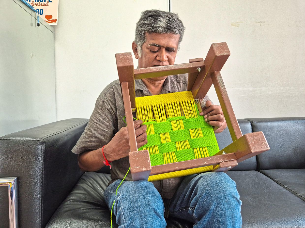 Despite being blind and living with Marfan syndrome, Saravanan has spent 25 years perfecting his craft. Photo: The Star/Sheela Chandran 