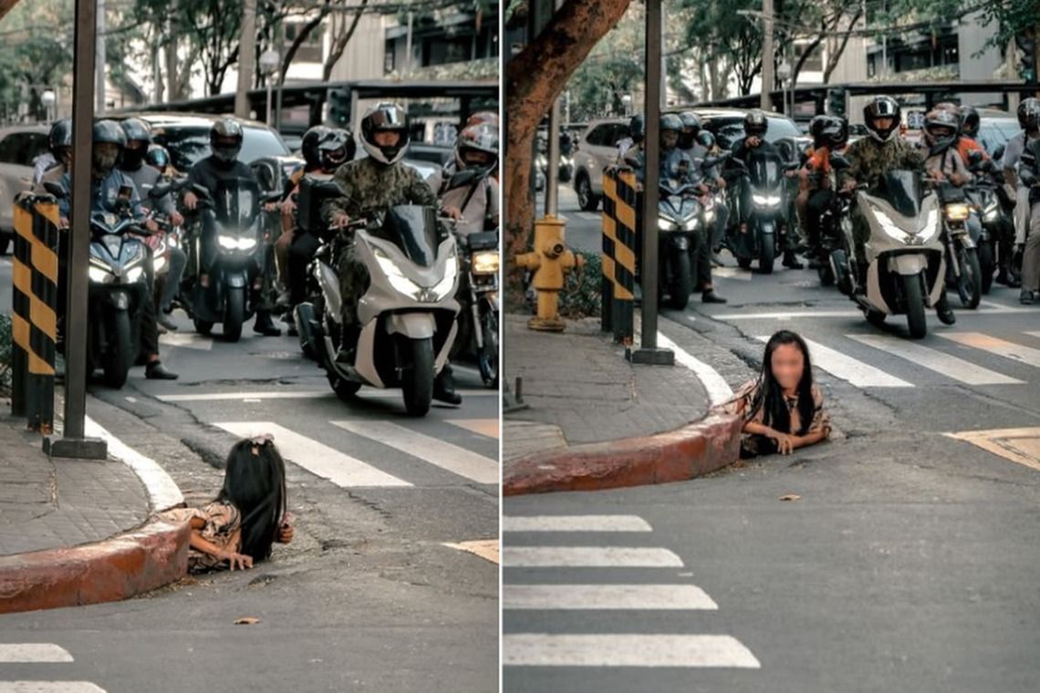 A street photographer took these photos of a woman crawling out of a storm drain in Manila’s main financial district. -- PHOTOS: WILLIAM ROBERTS/INSTAGRAM
