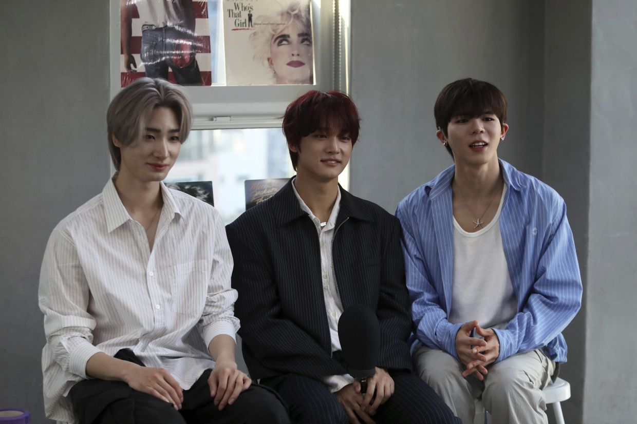 Members of K-pop band Big Ocean – (from left) Jiseok, PJ and Chanyeon – at an interview with The Associated Press in Seoul, South Korea. — AP