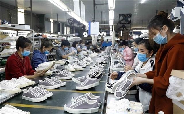 Vietnamese textile, footwear exporters eye target markets. - Photo: VNA/VNS 