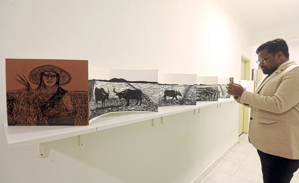 Leong’s 'Tadau Kaamatan' art book installation, measuring 4.3m long, was showcased at the 'GoBlock: Senibuku' exhibition at Cult Gallery, Kuala Lumpur, in August 2023. It has since been adapted into a children’s book titled 'Pesta Menuai'. Photo: The Star/Filepic 