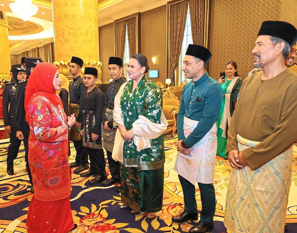 Her Majesty in conversation with artistes (starting third from right) Sherry Alhadad, Zizan Razak and Datuk M. Nasir during an afternoon tea session with the local creative industry in April this year. — Photo from Communications Minister Datuk Fahmi Fadzil’s Facebook page