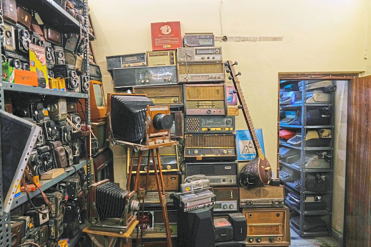 Old cameras, vintage radios, and typewriters line the shelves of collector and anthropologist Aditya Vij’s New Delhi home. Photo: AP 