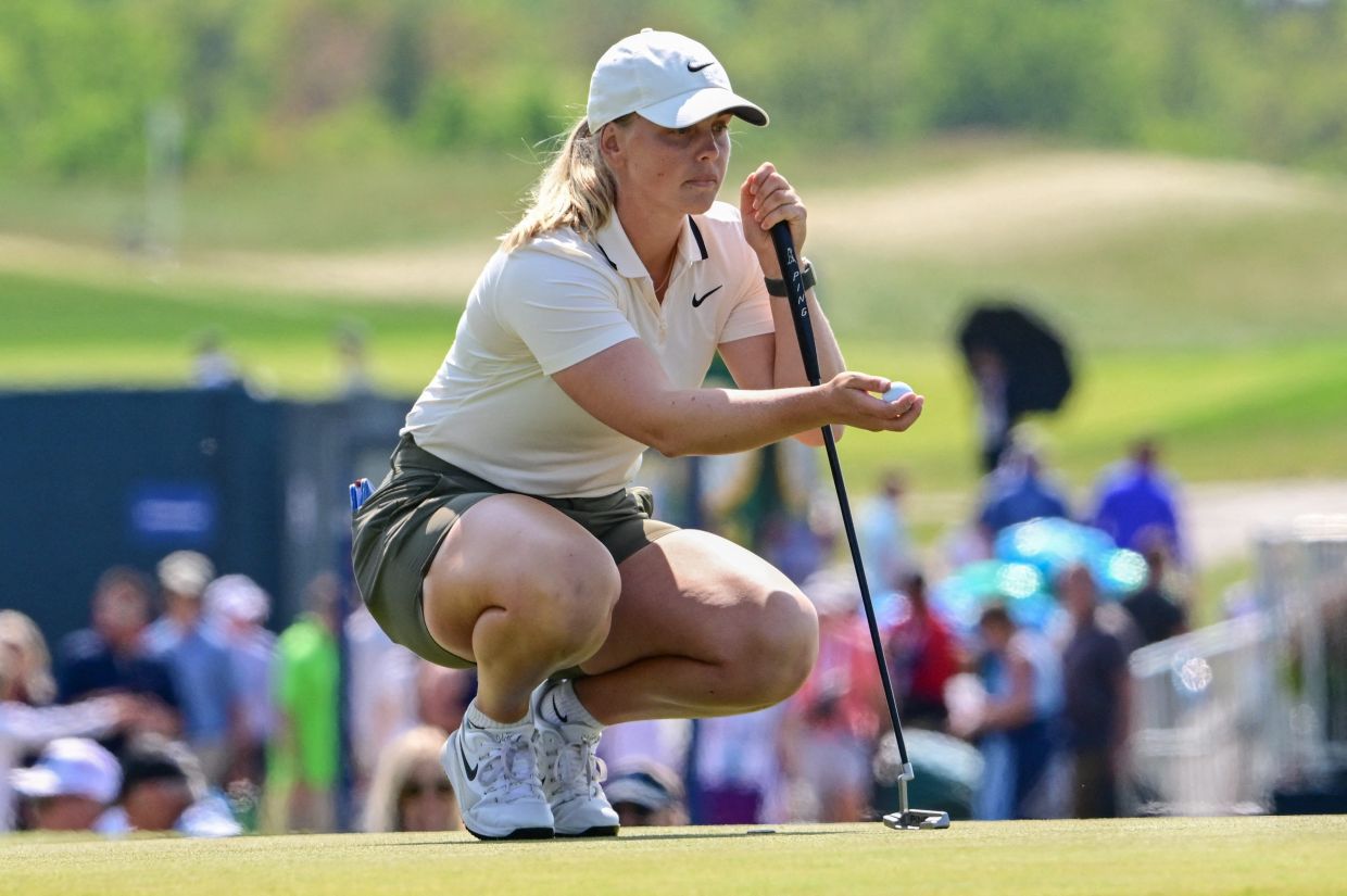 Jun 1, 2025; Erin, Wisconsin, USA; Maja Stark lines up a shot at the 9th hole during the final round of the US Women's Open golf tournament. -- Mandatory Credit: Benny Sieu-Imagn Images
