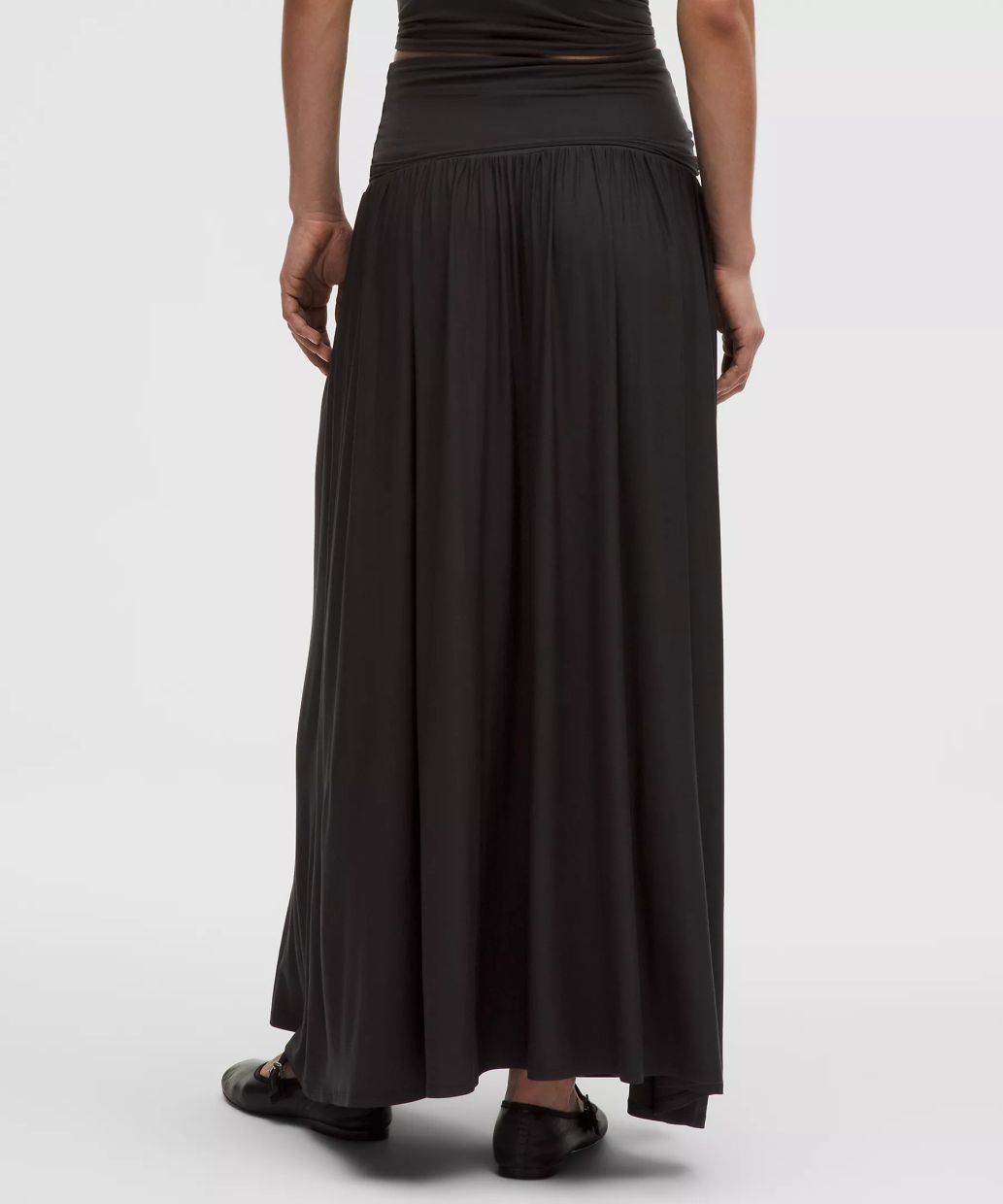 The piece converts into a skirt when the bodice is folded down. Photo: Lululemon