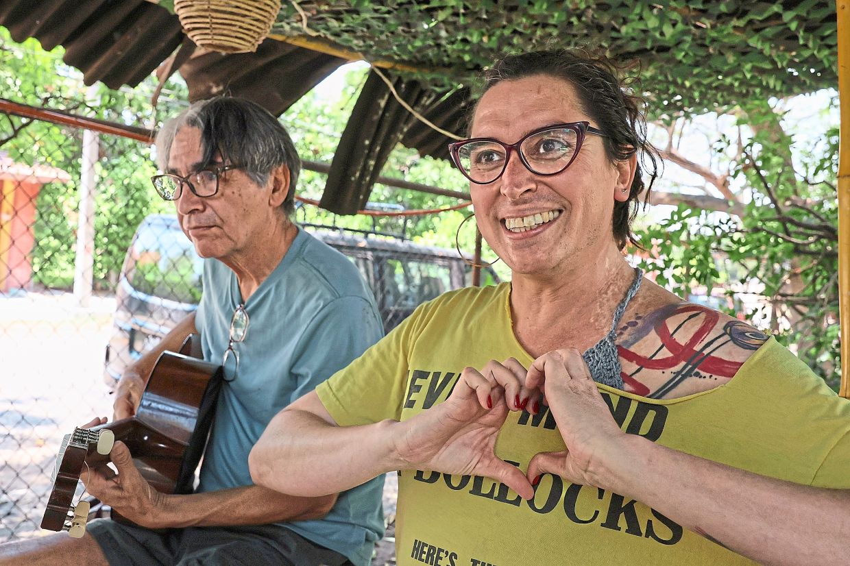 Mulato Teatro cast members, actress Annya Atanasio Cadena and musician Jesus Peredo (left), laying down a tune for their upcoming performance. Photo: AP
