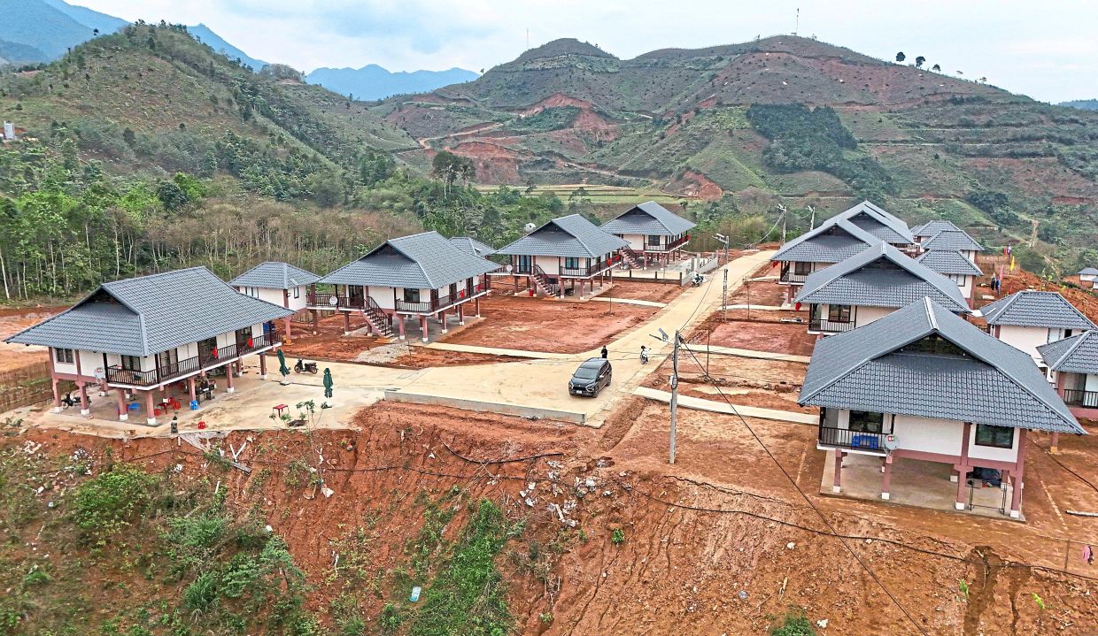 An aerial view of recently built houses at the new site of Lang Nu village. — AFP