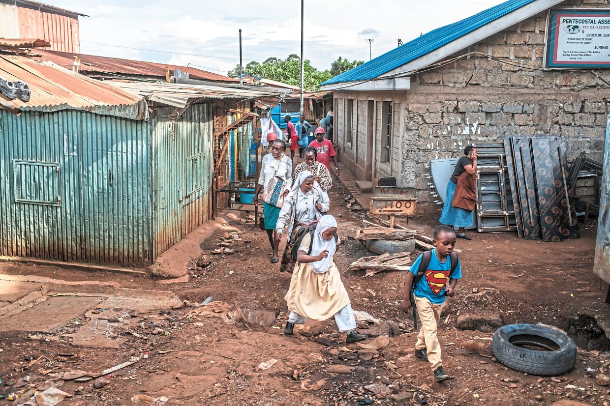 Residents of the Kibera slum of Nairobi. — Brian Otieno/The New York Times