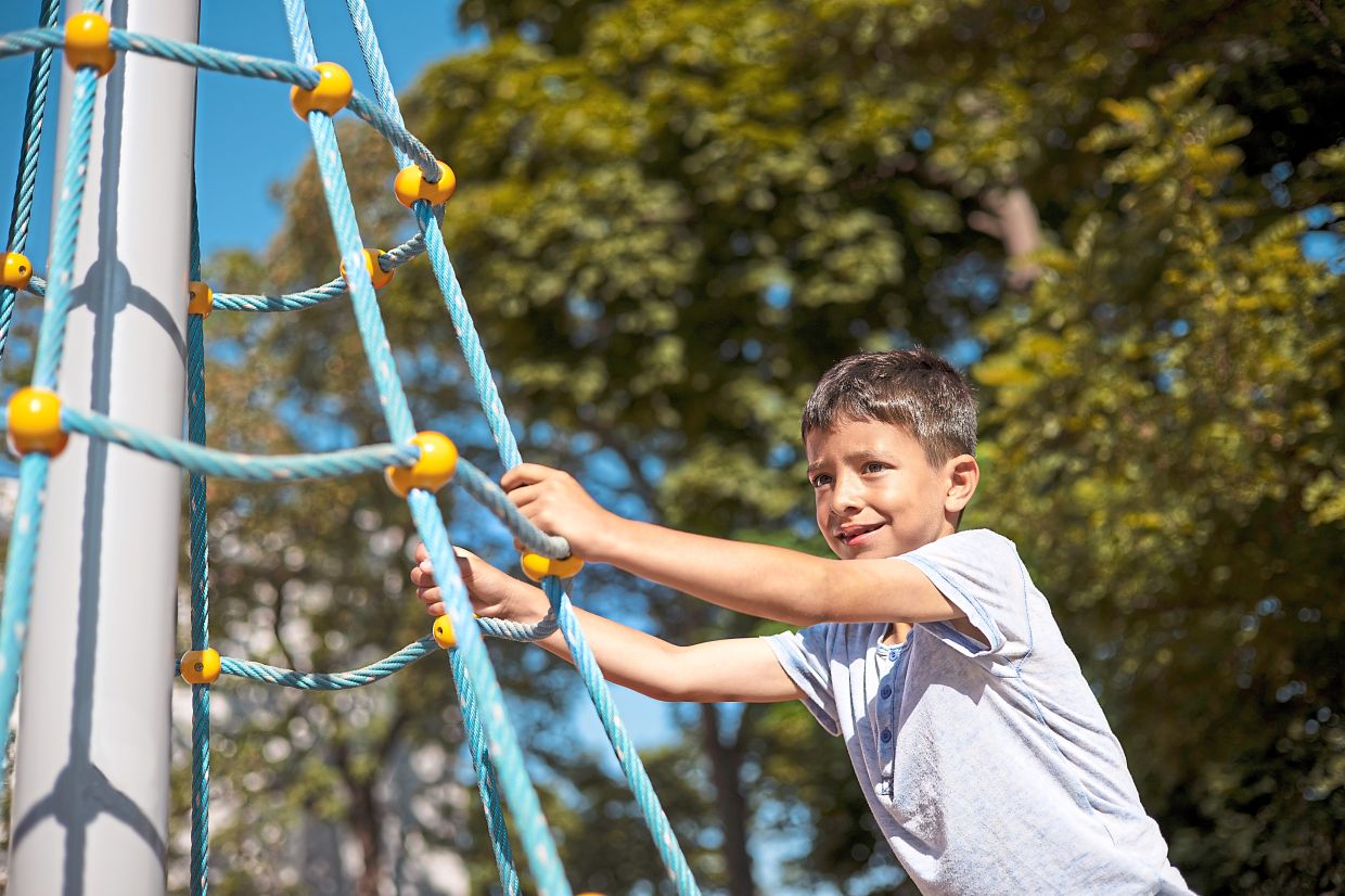 Climbing helps build strength, coordination and depth perception while letting kids see their surroundings on a different level. Photo: Freepik