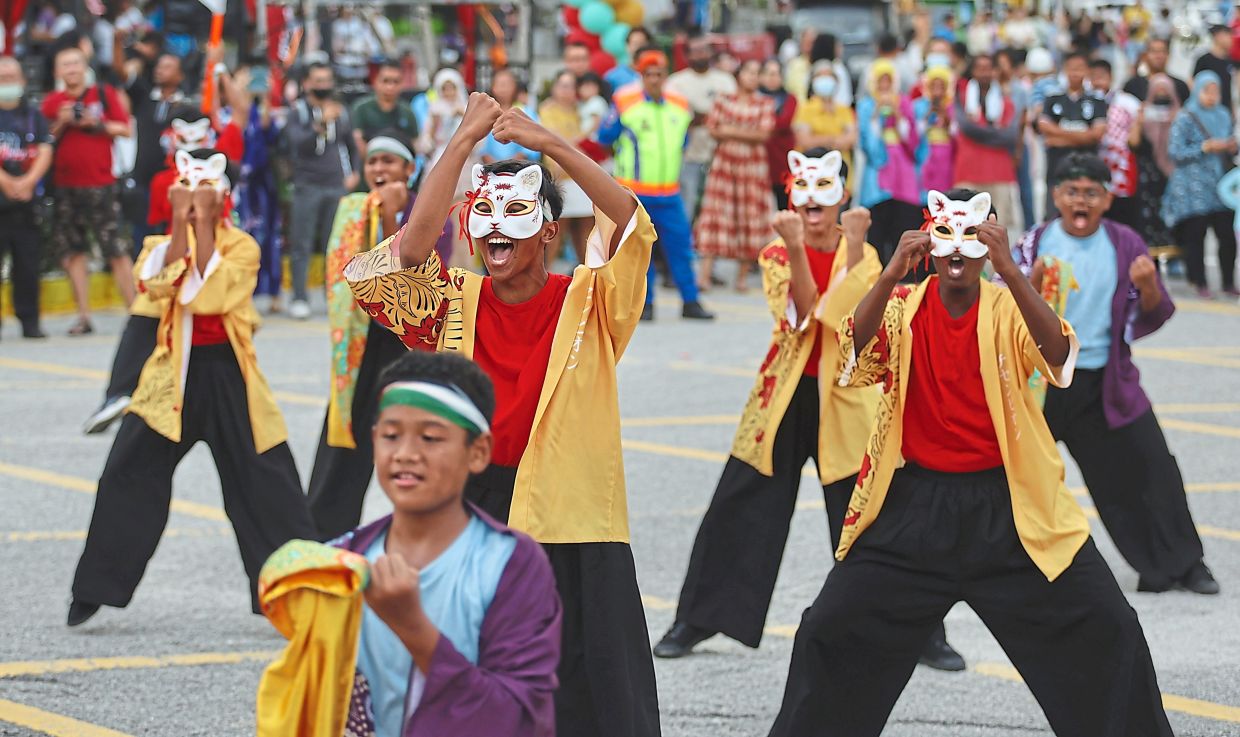 Participating groups showing off their well-choreographed routines and costumes during Penang Yosakoi Parade 2024.