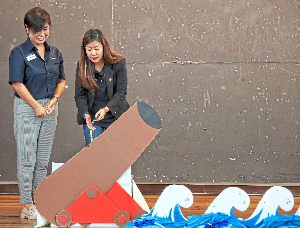 Lim (right) with Sin at the pre-launch event.