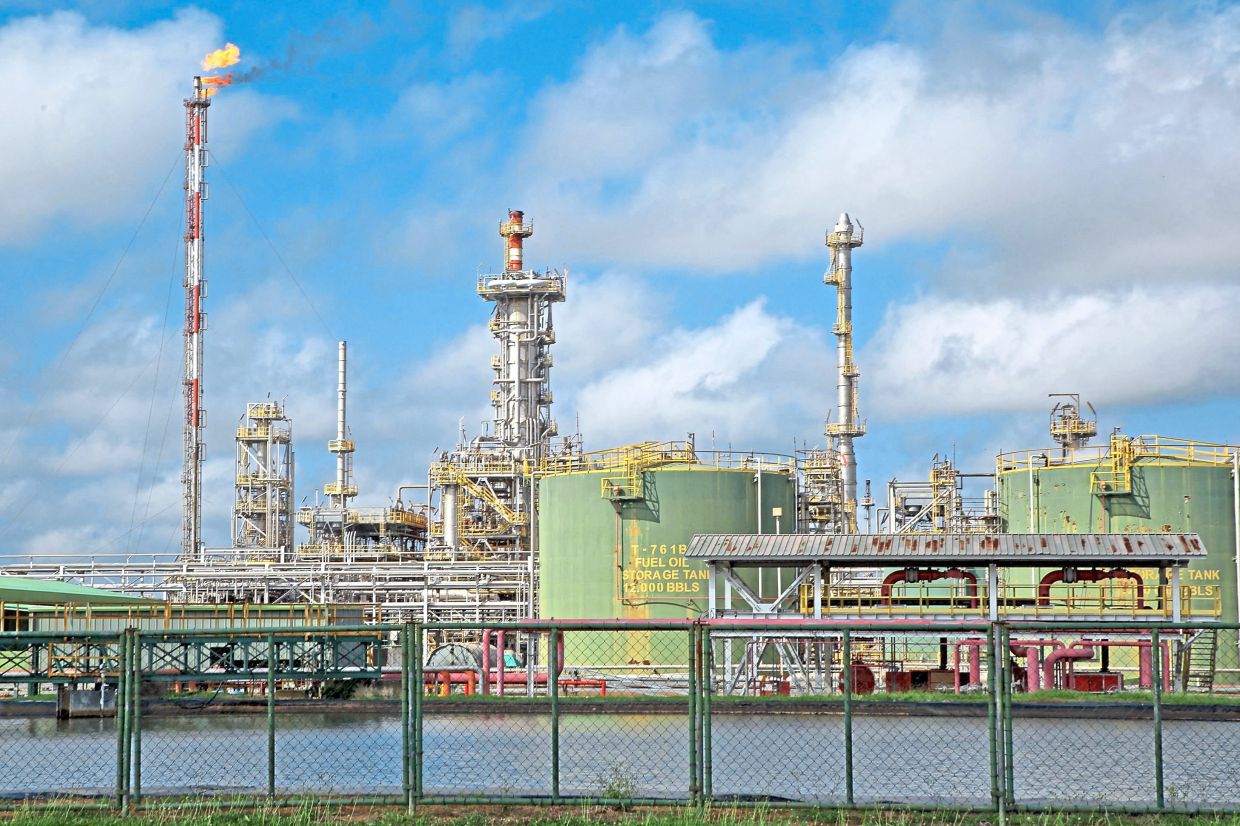 
Steady demand: The Staatsolie refinery owned by Suriname State Oil Company in Wanica, Suriname. Analysts warn that the current strength may soon fade as demand is hit by trade wars. — AFP 