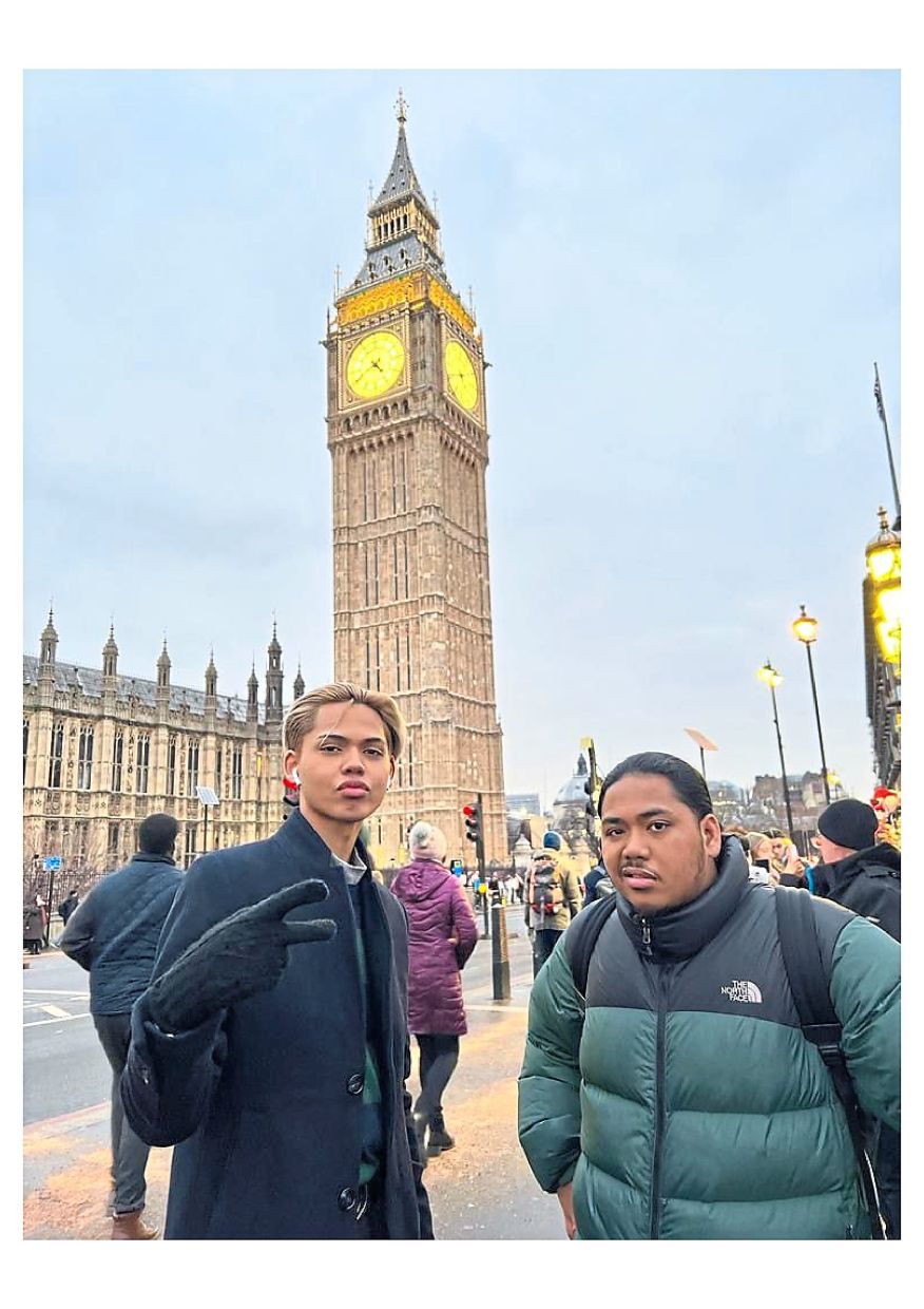 Eidl Adam (left) with his elder brother, Daniel Hakimi during their family holiday in Britain.
