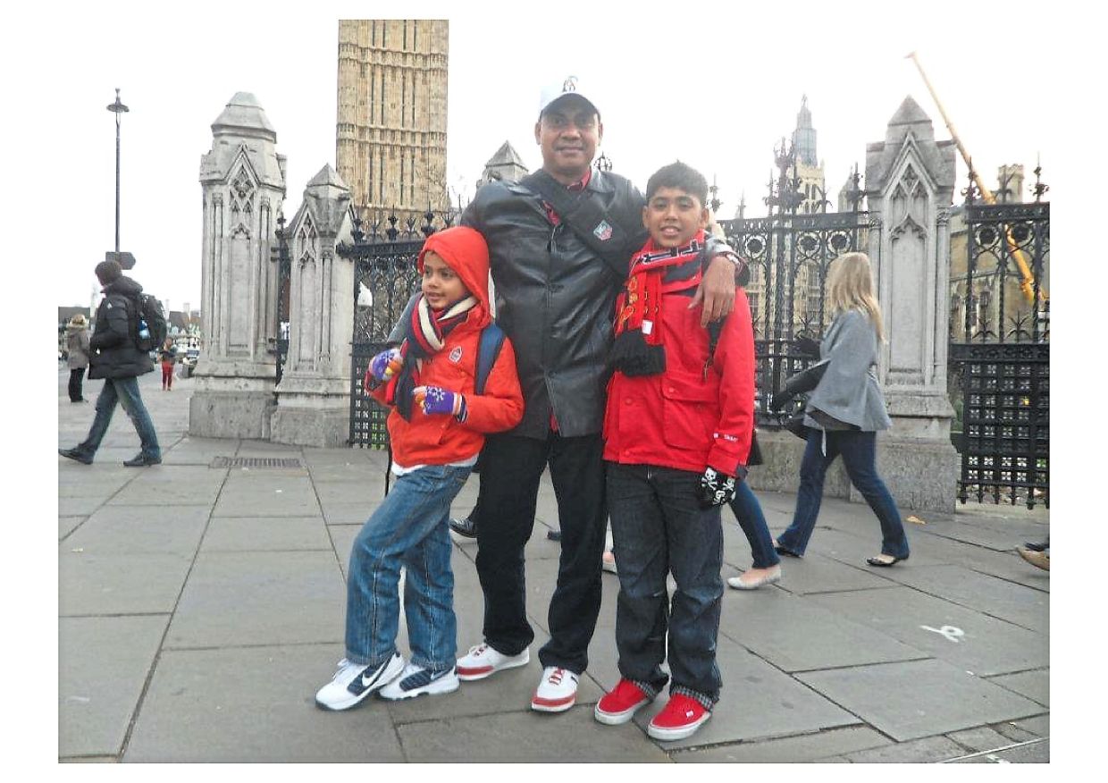 The boys and their dad while on holiday.