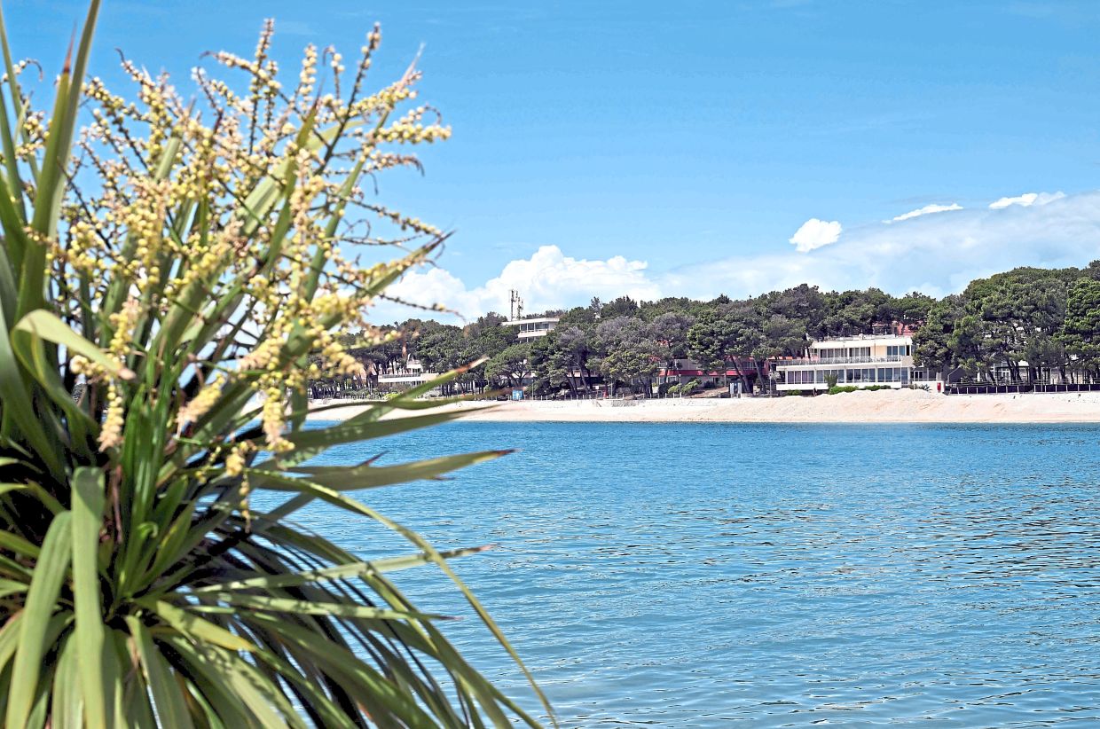 Municipalities have created artificial beaches like Primosten to accommodate the growing number of tourists. 