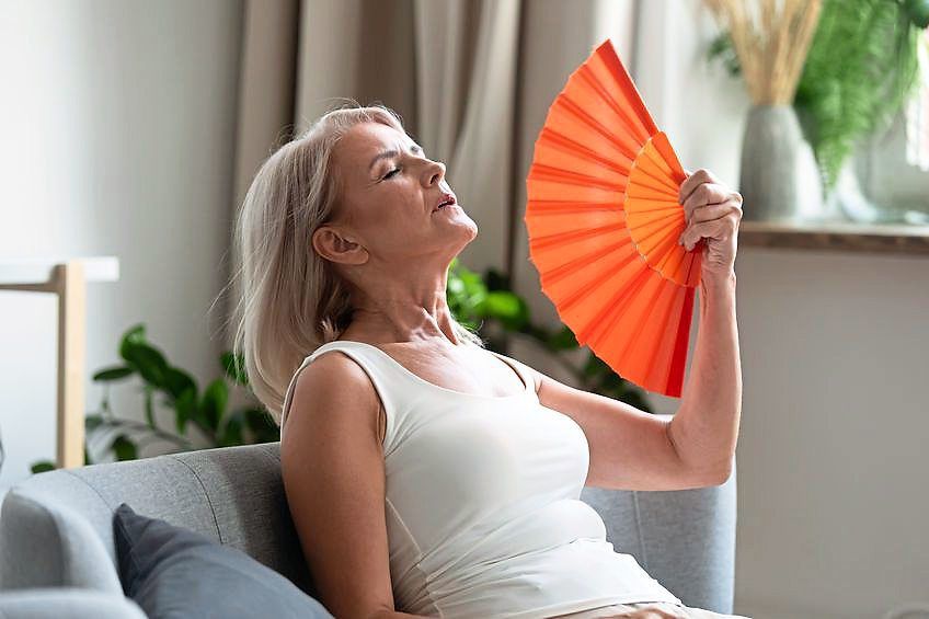 One of the symptoms of dehydration is the inability to tolerate heat. — 123rf.com
