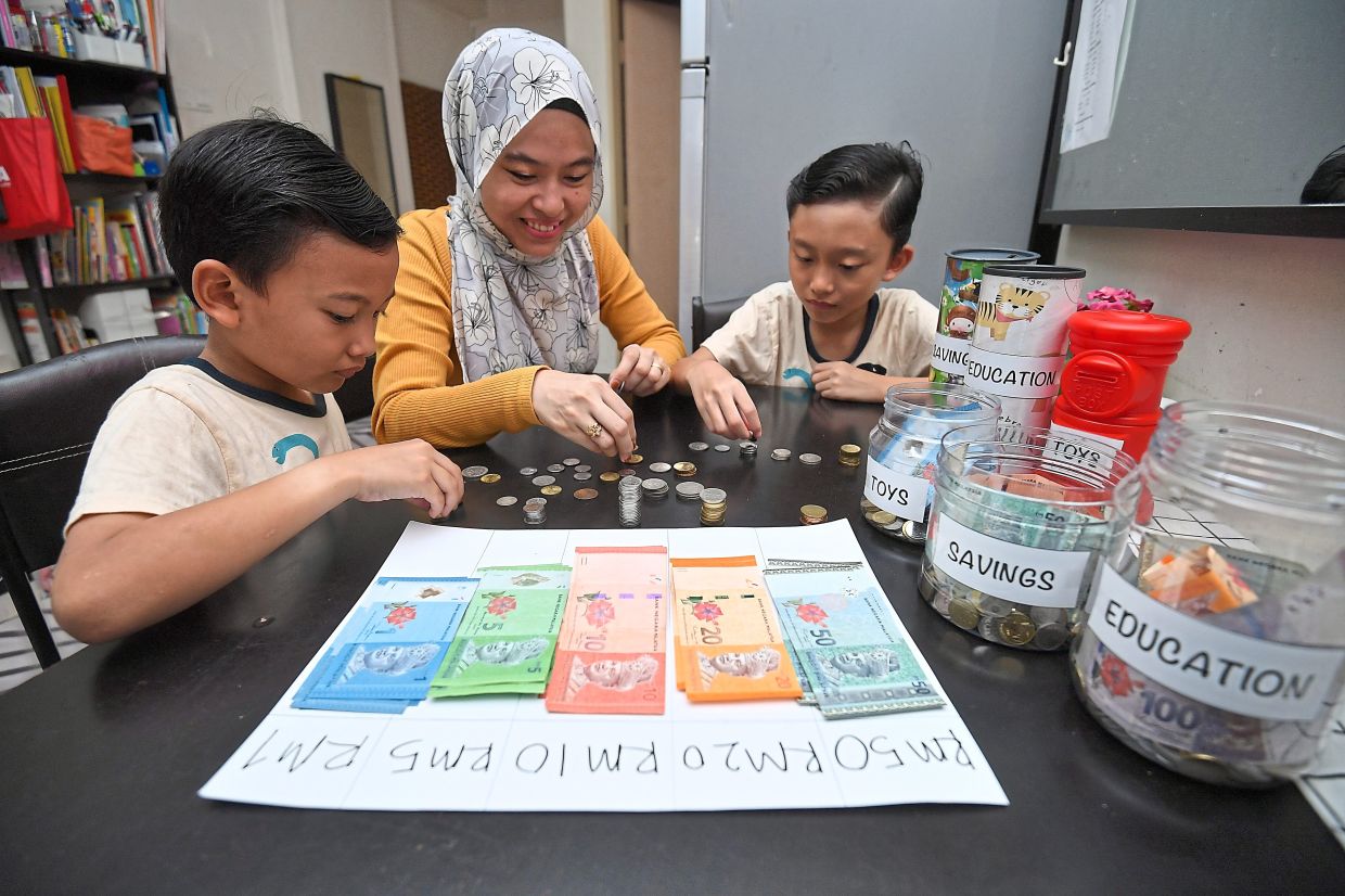 Making cents: Suraidah says that money can be grown and simply stashing it away won’t unlock its potential. — IZZRAFIQ ALIAS/The Star